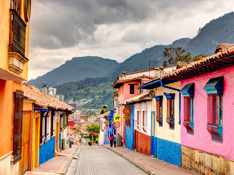 [Translate to Englisch:] A street with colorful houses in Colombia